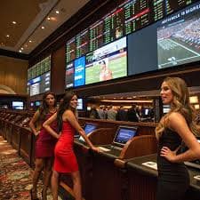 Filipino sports fan in Manila watching a PBA basketball game while checking phsky online odds
